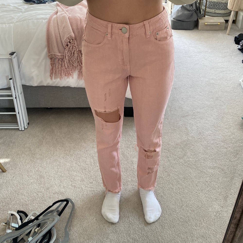 Pink ripped skinny jeans